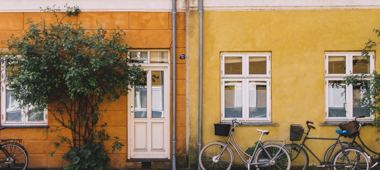 Bikes in front of colourful houses on Østerbro, Copenhagen